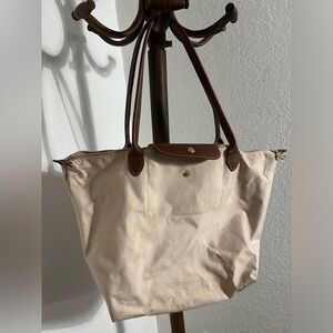 Medium cream Longchamp bag